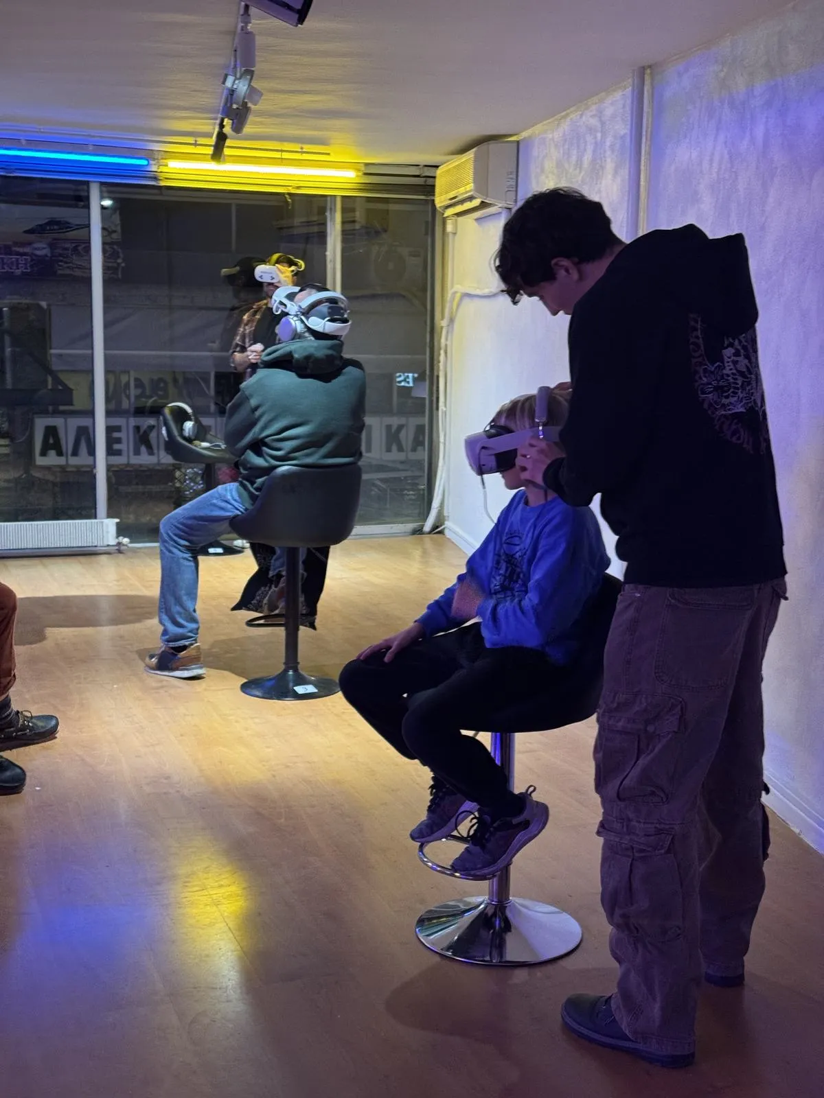 Visitors and operators during a VR cinema pop-up.